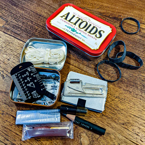 Mini Altoids tin with Wndsn Dog Tag fitted